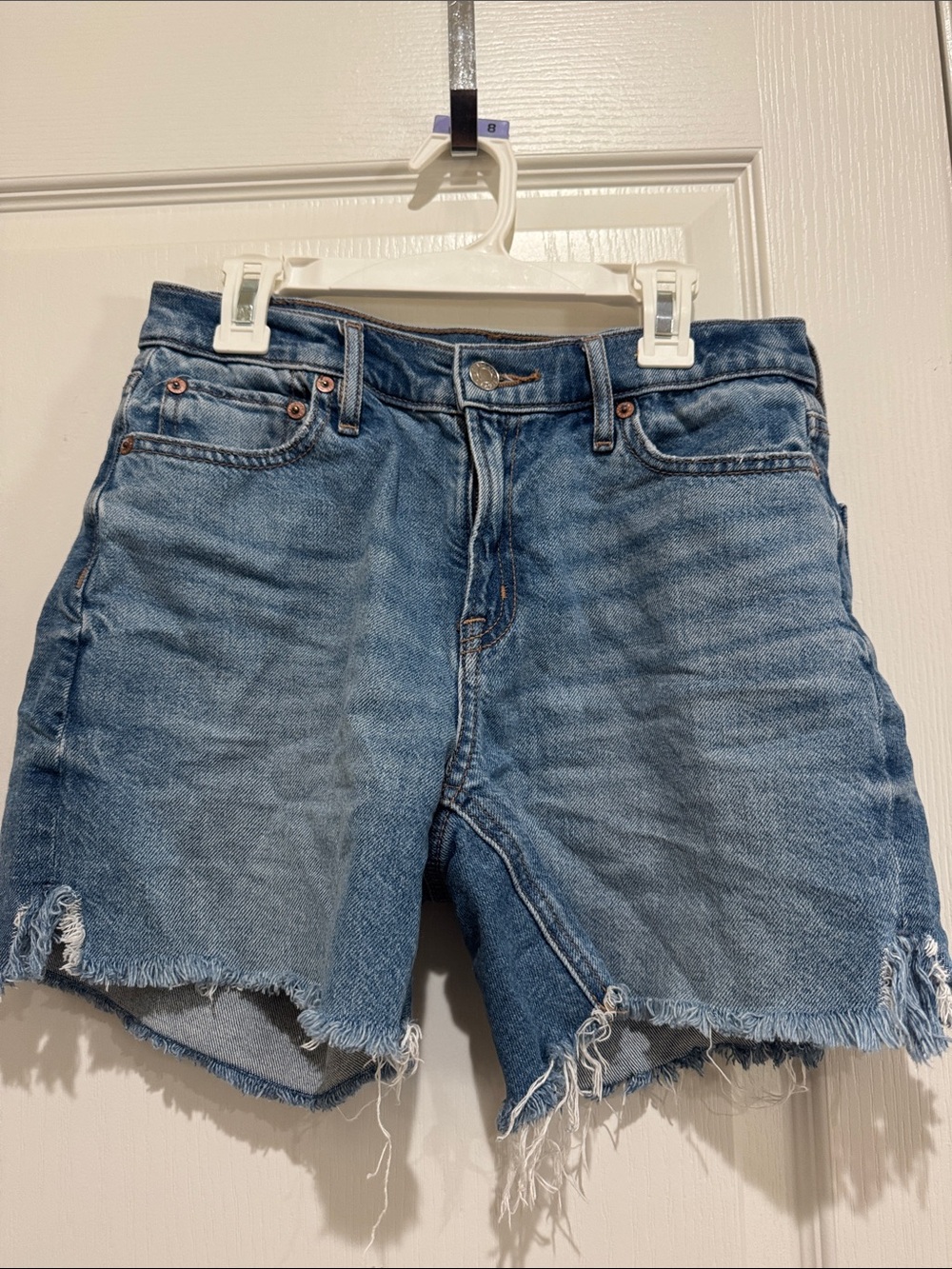 Washed Blue Denim Cutoff Shorts - Women's
